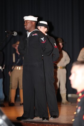 Petty Officer 3rd Class Marcus Bonds speaks on the importance of the Naval influences of the corpsman and chaplians in Marine Corps history during the Cherry Point 237th Marine Corps Ball Ceremony at the station theater Nov. 8.