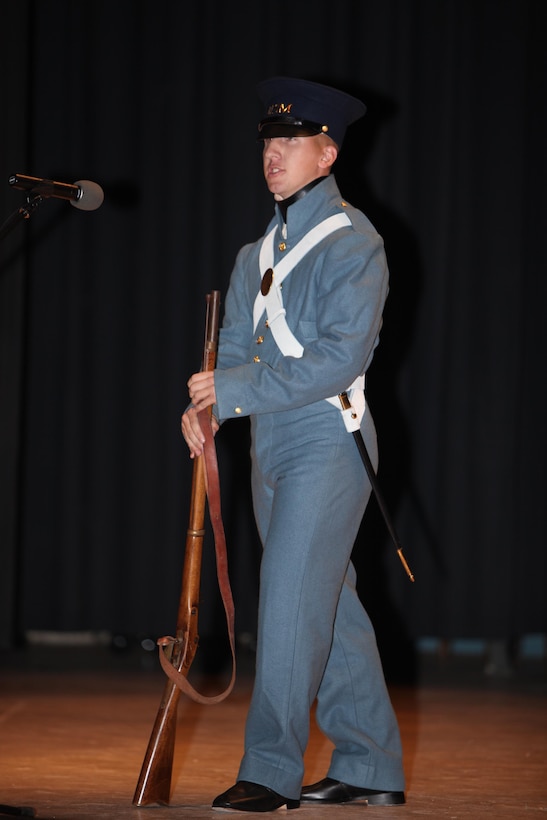 Lance Cpl. Brandon St. John is dressed as a Marine from the Mexican-American War Era and speaks about the Marine influence during the cake cutting ceremony of the Cherry Point 237th Marine Corps Ball Ceremony at the station theater Nov. 8.