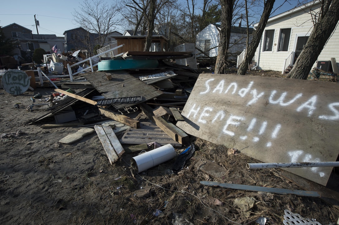 NEW YORK (Nov. 11, 2012) In the wake of Hurricane Sandy debris and destruction can be seen in and around the houses in Breezy Point, N.Y.  Hurricane Sandy was the largest Atlantic hurricane on record and caused the most damage in New York and New Jersey Oct. 29, 2012.  (U.S. Navy photo by Chief Mass Communication Specilalist Ryan J. Courtade/Released)