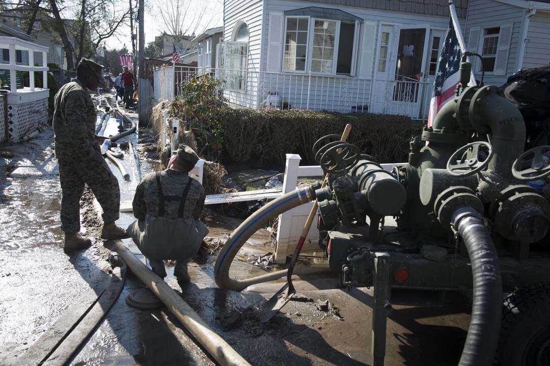 NEW YORK (Nov. 11, 2012) - Marines from the 8th Engineering Support Battalion (8th ESB) from Camp Lejeune, N.C. spent Veteran’s Day weekend continuing relief efforts for New York residents impacted by Hurricane Sandy.  Hurricane Sandy was the largest Atlantic hurricane on record and caused the most damage in New York and New Jersey Oct. 29, 2012.  (U.S. Navy photo by Chief Mass Communication Specilalist Ryan J. Courtade/Released)