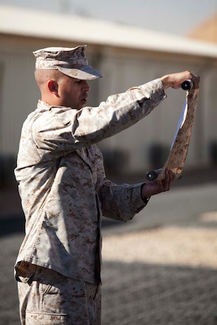 U.S. Marine Corps Capt. Jeremy M. Nelson, Headquarters Company, Regimental Combat Team 7, reads Gen. John A. Lejeune's birthday message during a cake cutting ceremony on Camp Leatherneck, Helmand province, Afghanistan, Nov. 10, 2012. The ceremony was conducted in celebration of the Marine Corps 237th birthday. (U.S. Marine Corps photo by Cpl. Alejandro Pena/Released)