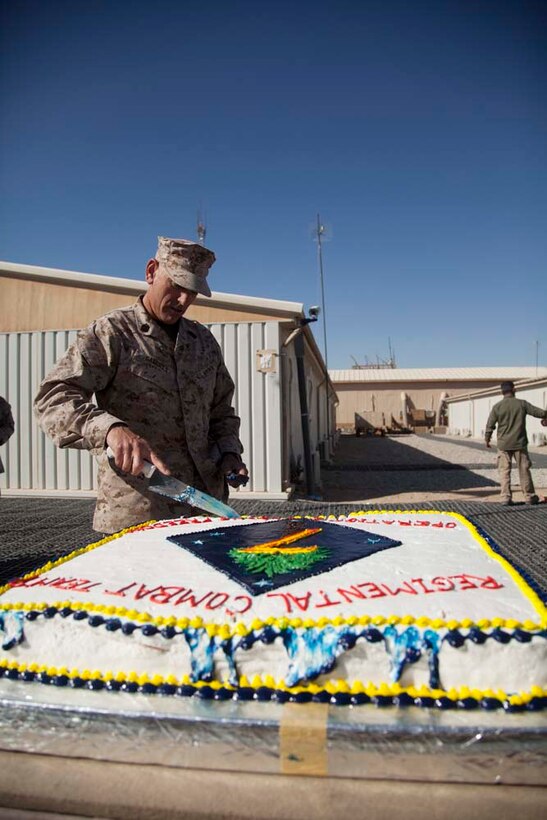 U.S. Marine Corps Sgt. Maj. Scott A. Samuels, Sergeant Major, Regimental Combat Team 7, cuts the birthday cake during a cake cutting ceremony on Camp Leatherneck, Helmand province, Afghanistan, Nov. 10, 2012. The Marines of Headquarters Company, Regimental Combat Team 7, conducted this ceremony to celebrate the Marine Corps 237th birthday. (U.S. Marine Corps photo by Cpl. Alejandro Pena/Released)
