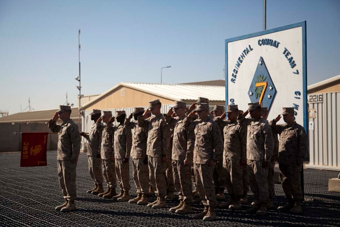 U.S. Marines with Headquarters Company, Regimental Combat Team 7 participate in a cake cutting ceremony on Camp Leatherneck, Helmand province, Afghanistan, Nov. 10, 2012. The ceremony was conducted in celebration of the Marine Corps 237th birthday. (U.S. Marine Corps photo by Cpl. Alejandro Pena/Released)