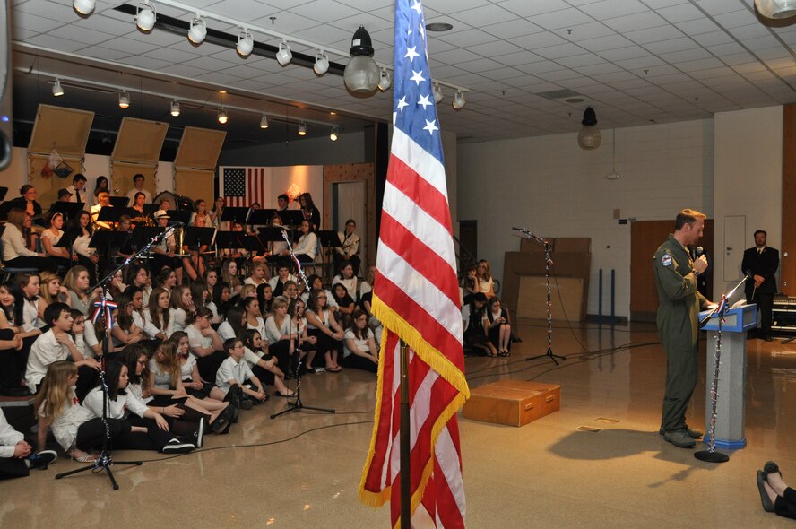 Lt. Col. David Piffarerio, 302nd Fighter Squadron commander, was the key note speaker during a Tribute to Veterans concert at Palmer Junior Middle School in Palmer Alaska Nov. 9, 2012. Piffarerio spoke to the students and parents in attendance about what being a veteran means to him; he also gave a brief lesson on the history of Veterans Day. (Air Force Reserve Photo/Tech. Sgt. Dana Rosso)