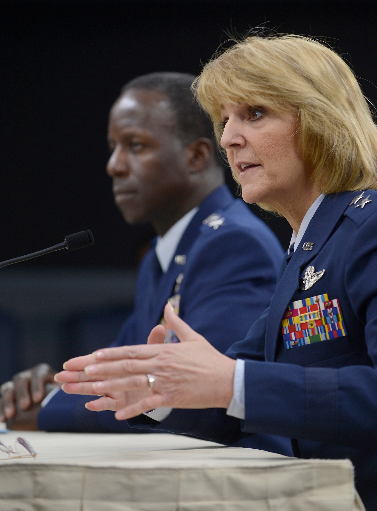 Maj. Gen. Margaret Woodward, Air Force Chief of Safety and commander of Air Force Safety Center at Kirtland Air Force Base, N.M., answers questions with Gen. Edward Rice Jr., commander of Air Education and Training Command, during a Pentagon press briefing on Nov. 14, 2012.  Rice presented the findings relating to Woodward's investigation into allegations of sexual misconduct at Basic Military Training.  (U.S. Air Force photo/Scott M. Ash)