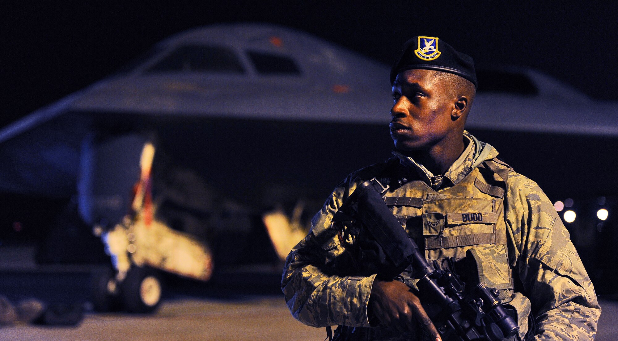 WHITEMAN AIR FORCE BASE, Mo. -- Airman 1st Class Arlando Budd, 509th Security Forces Squadron response force member, remains vigilant while providing close bound sentry for a B-2 Spirit Oct. 28. During this security detail, Budd must watch his area of responsibility to ensure unauthorized personnel don’t enter the zone. (U.S. Air Force photo/Senior Airman Nick Wilson) (Released)