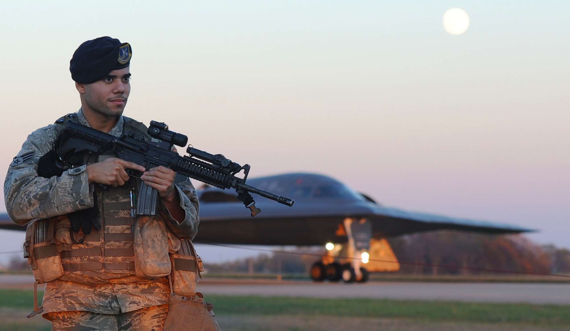 WHITEMAN AIR FORCE BASE, Mo. -- Senior Airman Richie Madrigal, 509th Security Forces Squadron response force member, provides close bound sentry for a B-2 Spirit Oct. 28. The 509th SFS maintains current defense skills to protect base assets and follow the Air Force Global Strike Command vision of being an elite, highly disciplined team. (U.S. Air Force photo/Senior Airman Nick Wilson) (Released)