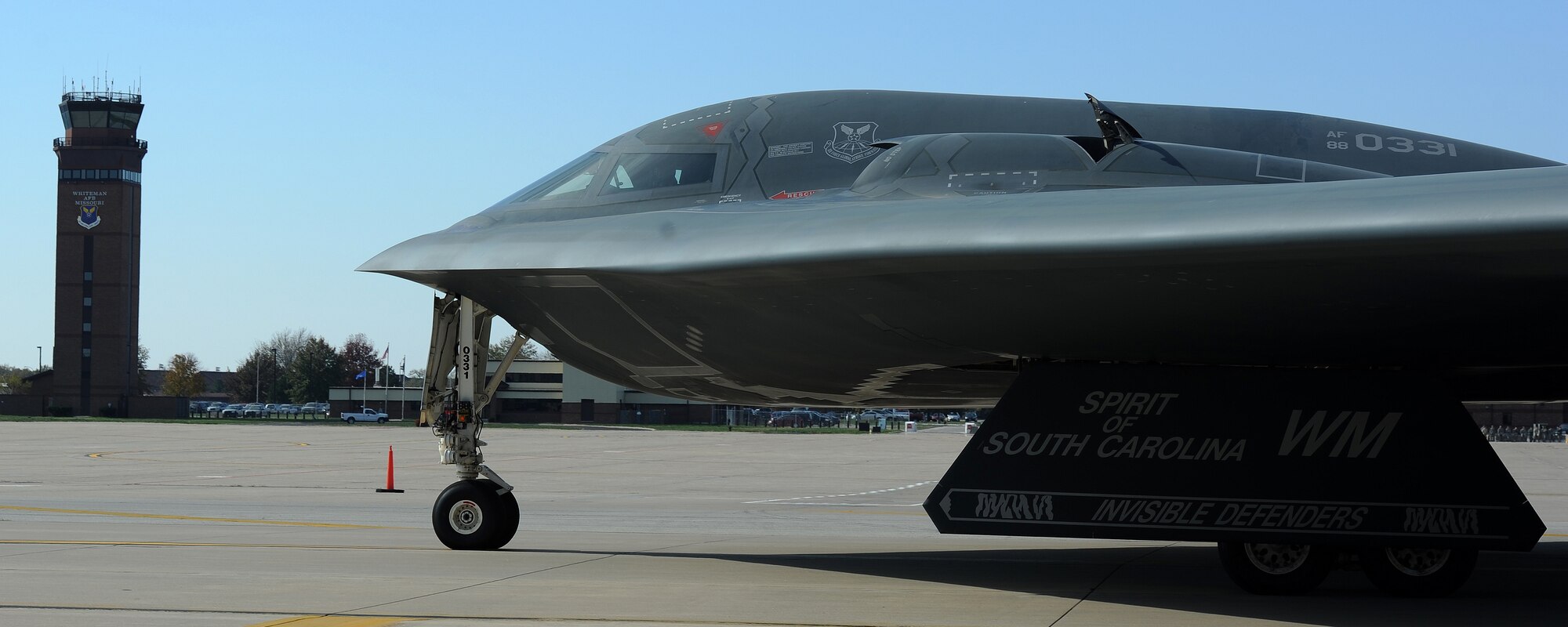 WHITEMAN AIR FORCE BASE, Mo. -- A B-2 Spirit communicates with the air traffic control tower as it taxis the flightline Oct. 26. With eyes in the sky 24/7, Airmen working in the air traffic control tower ensure aircraft like the B-2 can taxi in and out of the airfield safely and in a timely manner. (U.S. Air Force photo/Senior Airman Nick Wilson) (Released)