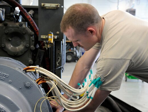 Staff Sgt. Michael Powell, 2nd Maintenance Squadron Aerospace Ground Equipment flight, rewires a generator on Barksdale Air Force Base, La., Nov. 14. The AGE flight maintains equipment and tools which keep aircraft operational. (U.S. Air Force photo/Airman 1st Class Andrew Moua)(RELEASED)
