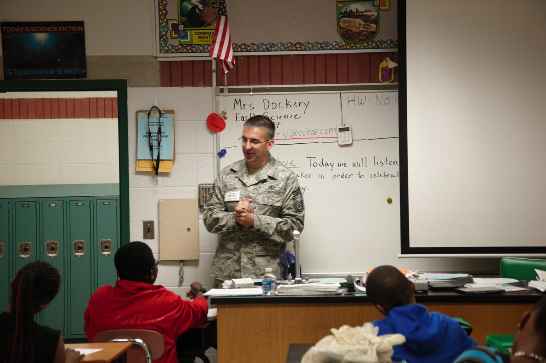 WALDORF, Md. -  Chief Craig LeDeux, U.S. Air Force Band chief enlisted manager, speaks with youths about his military experience at Mattawoman Middle Schools' Veterans Day program, Nov. 9, 2012. Veterans spoke with nearly 150 students at the yearly event. (U.S. Air Force photo/ Senior Airman Amber Russell)