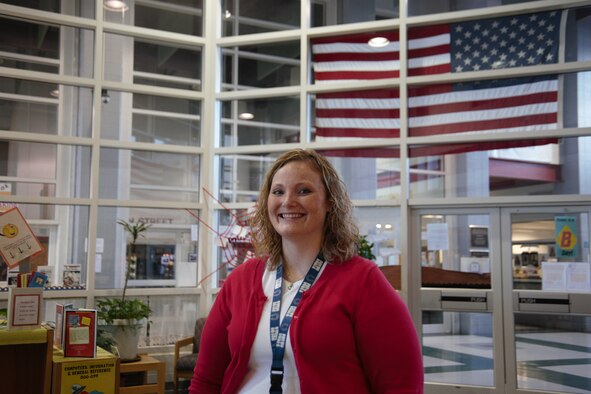 WALDORF, Md. - Andrea Hoover, Mattawoman Middle Schools' social studies department head, takes a photo during the Veterans Day program Nov. 9, 2012.  Hoover rallied several Joint Base Andrews service members and veterans around the National Capital Region to support the event. (U.S. Air Force photo/ Senior Airman Amber Russell)