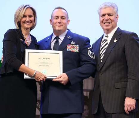 Master Sgt. Anthony Blodgett receives the National Safety Council 'Rising Star of Safety' award from Janet Froetscher, NSC president, and Kent McElhattan, NSC chairman of the board. (Courtesy photo)