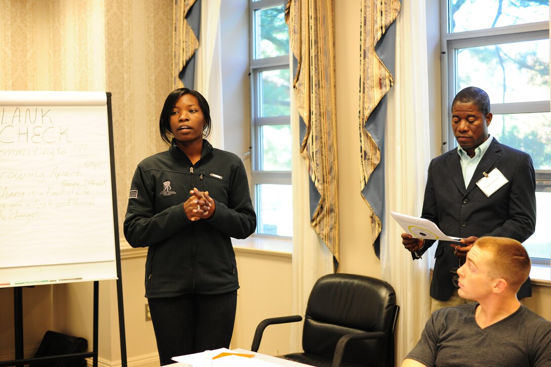 WALDORF, Md. - Senior Airman Candace Moyd, 779th Medical Operations mental health technician, leads a discussion about dating violence during a chapel sponsored singles retreat at Bolger Center Resort in Potomac, Md., Oct. 12-14, 2012. The retreat served to promote healthy and successful communication in male and female relationships. (U.S. Air Force photo/ Senior Airman Amber Russell)
