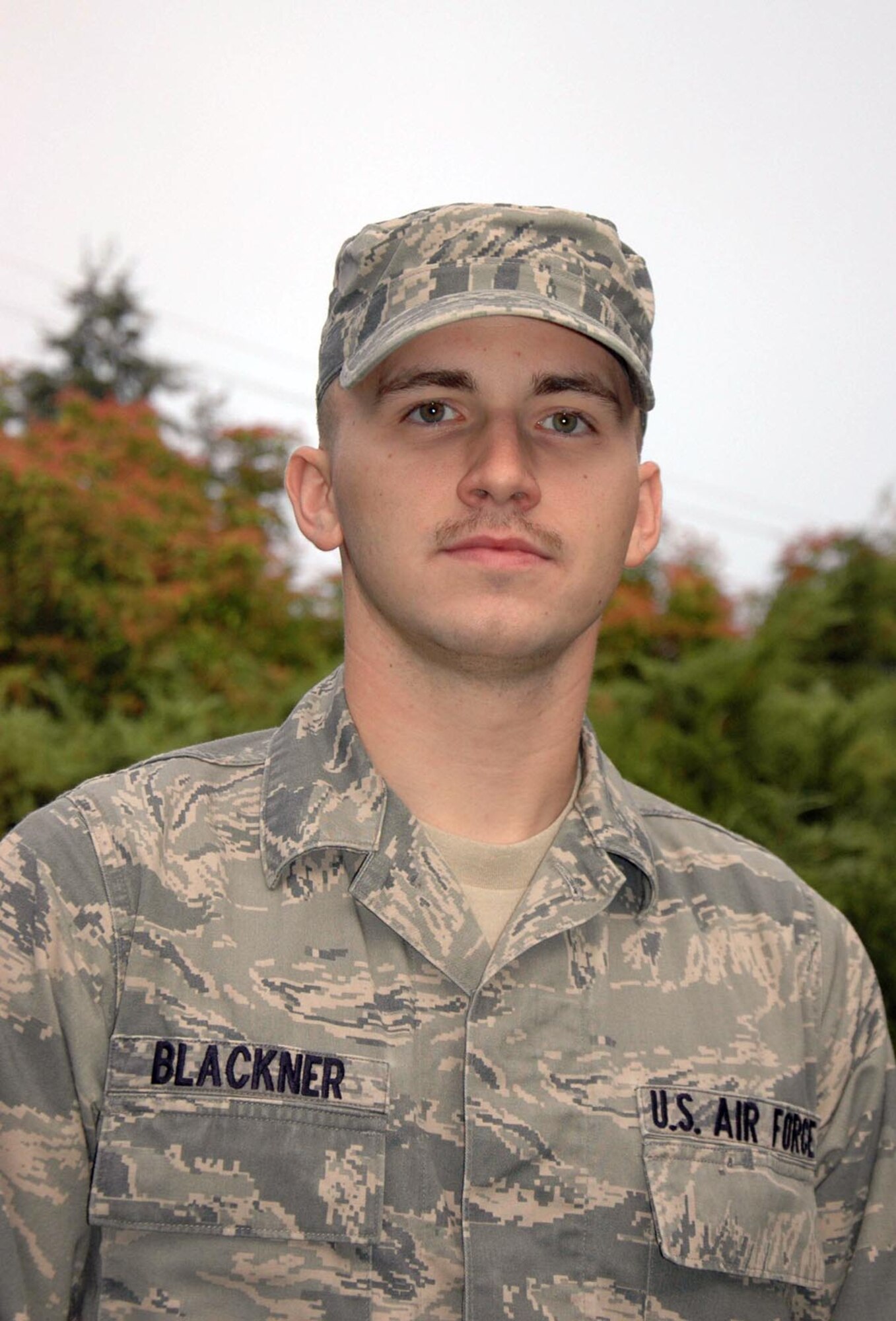 The combination of cold tires, morning dew, and the wrong angle crossing pavement markers sent Senior Airman Justin Blackner and his motorcycle to the ground just outside his home Oct. 1. Blackner is a Reservist with the 446th Civil Engineer Squadron, Joint Base Lewis-McChord, Wash. (U.S. Air Force photo by Sandra Pishner)
