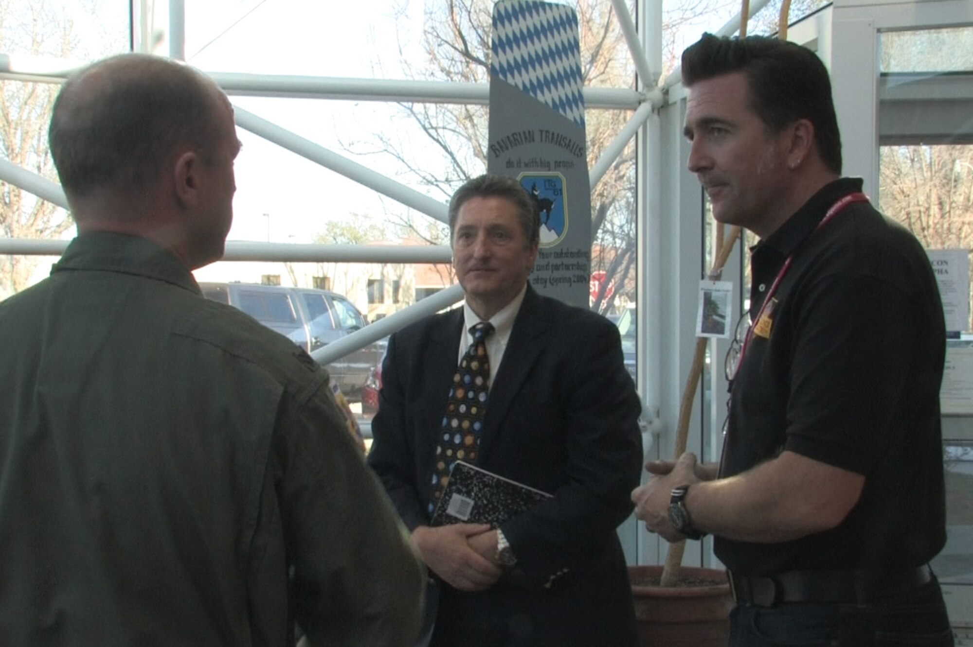 From left, Col. Edward Black, commander, Air National Guard Advanced Airlift Tactics Training Center (AATTC); Dr. Don Erbschloe, chief scientist for Air Force Air Mobility Command; and Dr. Adam Steltzner, phase lead and development manager for NASA’s Entry Descent and Landing on the Mars Science Laboratory Project speak Nov. 6 at the AATTC in St. Joseph, Mo. Steltzner joined with Air Mobility experts from across the Air Force to consider problems in airdrop. (Air National Guard photo, Tech. Sgt. Michael Crane/released)