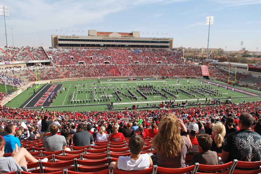 Military members and their dependants gather together at Texas Tech University’s football stadium as part of military appreciation day at Lubbock, Texas, Nov. 11, 2012. The band, cheer, spirit and dance squads all synchronize together on the field during half-time to spell out all the letters that represent each branch of the military. (U.S. Air Force photo/Desiree Montenegro)