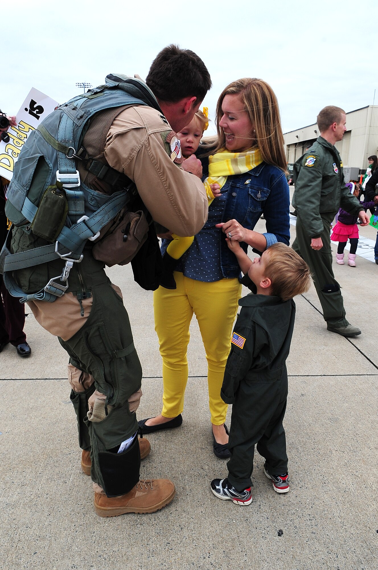 The Kiser family welcome home U.S. Air Force Capt. Aaron Kiser, 336th Fighter Squadron pilot, on Seymour Johnson Air Force Base, N.C., Nov. 14, 2012. Approximately 150 Airmen returned home from a six-month deployment to the Middle East. (U.S. Air Force photo/Airman 1st Class Aubrey White/Released)