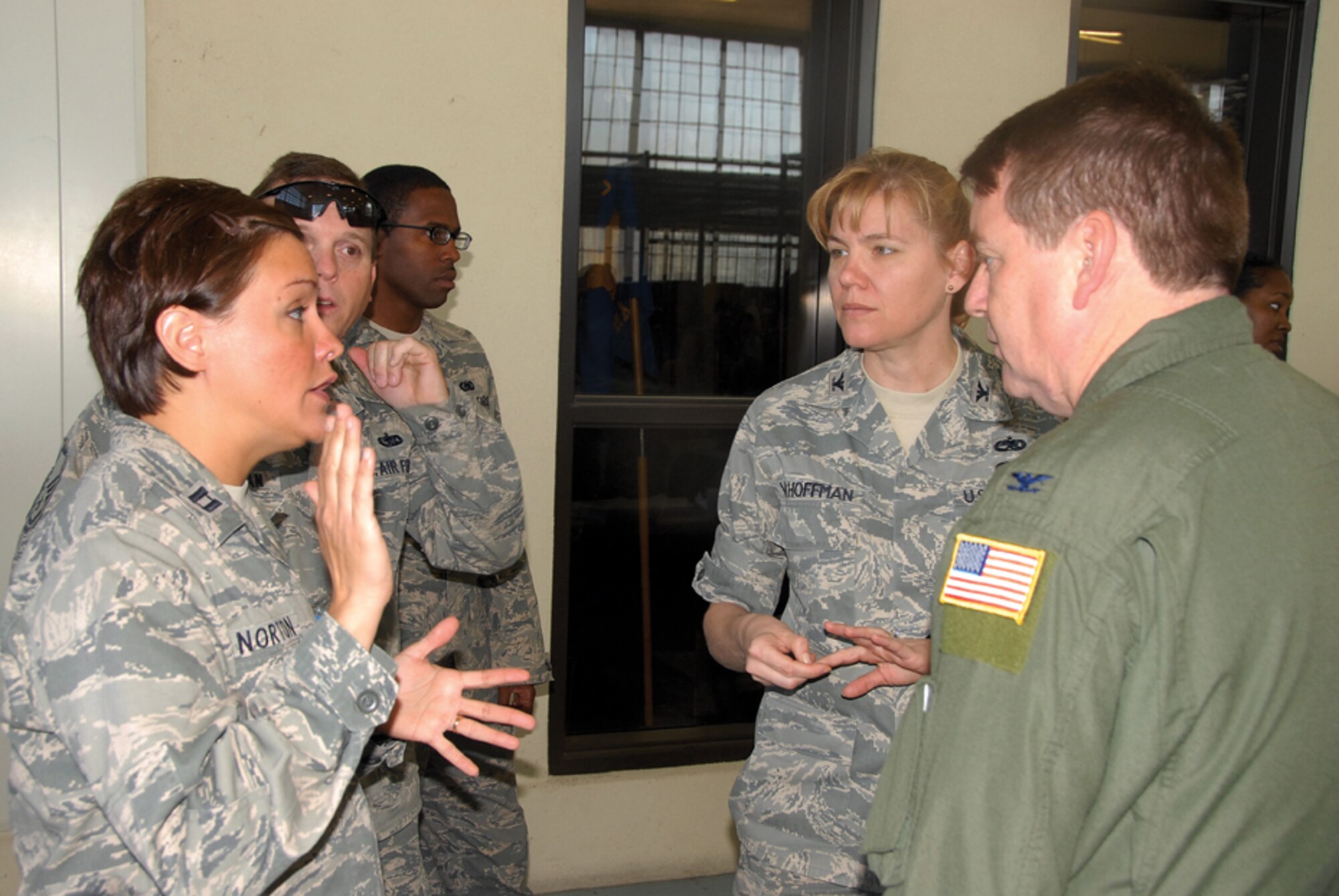 Then-Capt. Norton, left, working in LDRS, was a major force in getting the personnel and equipment of the 908th out the door during the 2010 AEF deployment.