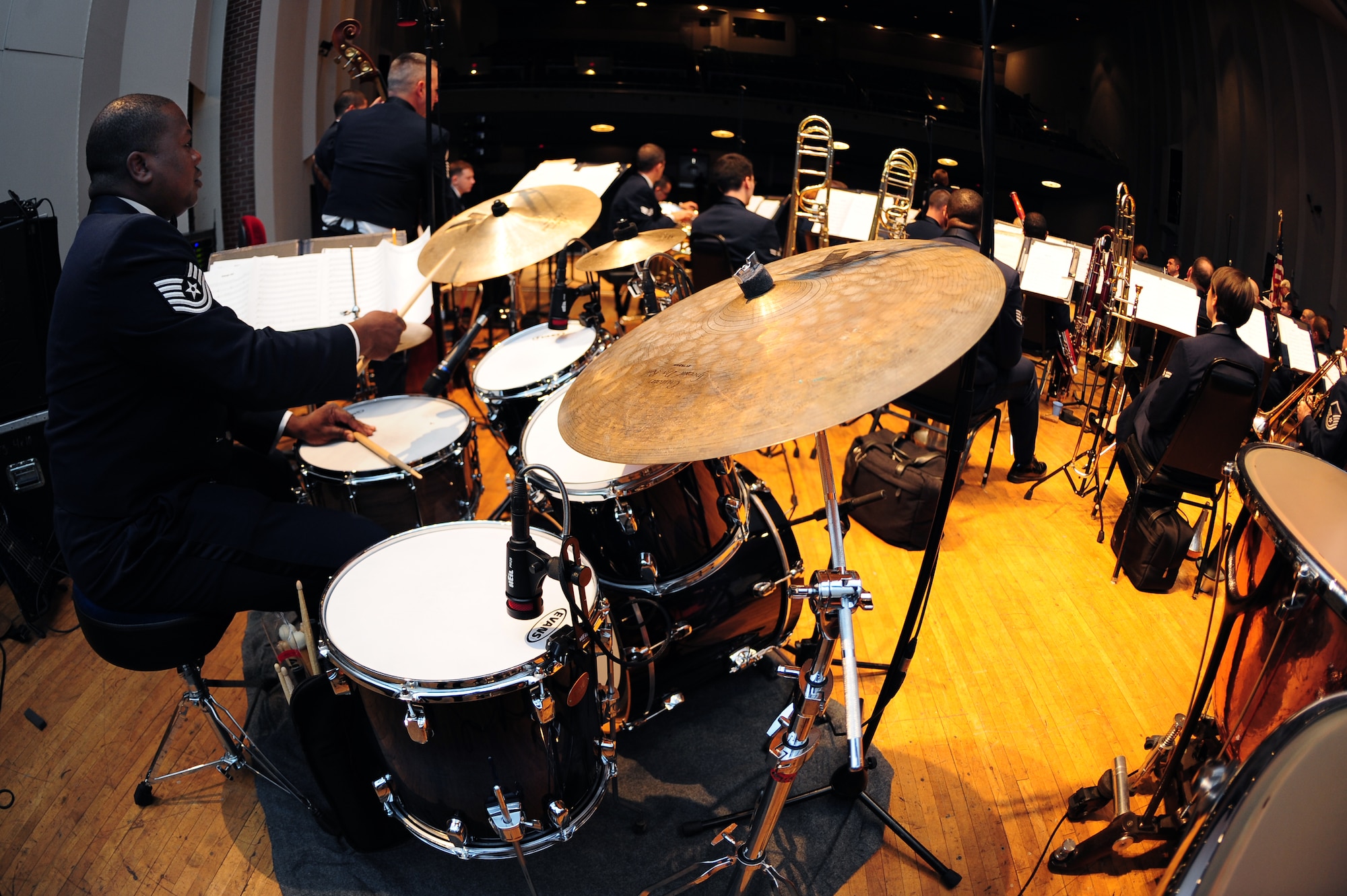 U.S. Air Force Tech. Sgt. Edward Williams, U.S. Air Force Heritage of America Band percussionist, plays the drums during a sound check prior to the band’s performance at the War Memorial Auditorium in Greensboro, N.C., Nov. 10, 2012. The band plays approximately 25 concerts a year in venues from Pennsylvania to South Carolina. Williams hails from New York. (U.S. Air Force photo/Airman 1st Class Aubrey White/Released)