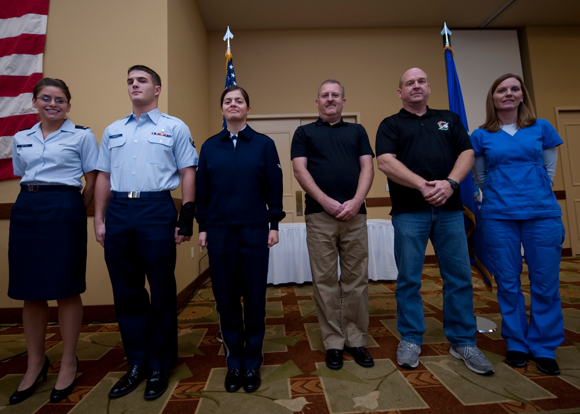 The 1st Special Operations Wing 3rd quarter award winners stand for recognition during the quarterly awards ceremony at the Soundside Club on Hurlburt Field, Fla., Nov. 13, 2012. (From left to right) 2nd Lt. Jessica Watts, 1st Special Operations Aircraft Maintenance Squadron; Airman 1st Class Daniel Dunwald, 1st Special Operations Medical Operations Squadron; Senior Airman Christina Manella, 1st Special Operations Security Forces Squadron; David Caudill, 1st Special Operations Medical Support Squadron; Rex Watkins, 1st Special Operations Equipment Maintenance Squadron and Diane Frazetta, 1st Special Operations Medical Operations Squadron, received awards for excellent job performance. (U.S. Air Force photo/ Airman 1st Class Nigel Sandridge)