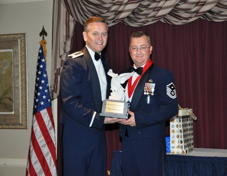 507th Air Refueling Wing

11/14/2012 – TINKER AIR FORCE BASE, Okla. – Master Sergeant Joseph P. Lepine of the 507th Maintenance Group accepts the First Sergeant of the Year Award from 507th Air Wing Commander, Colonel Russell A. Muncy.  The award was received at the Annual Awards Ceremony held on base recently as family, friends and guests from the 507th celebrated all the nominees and winners.
