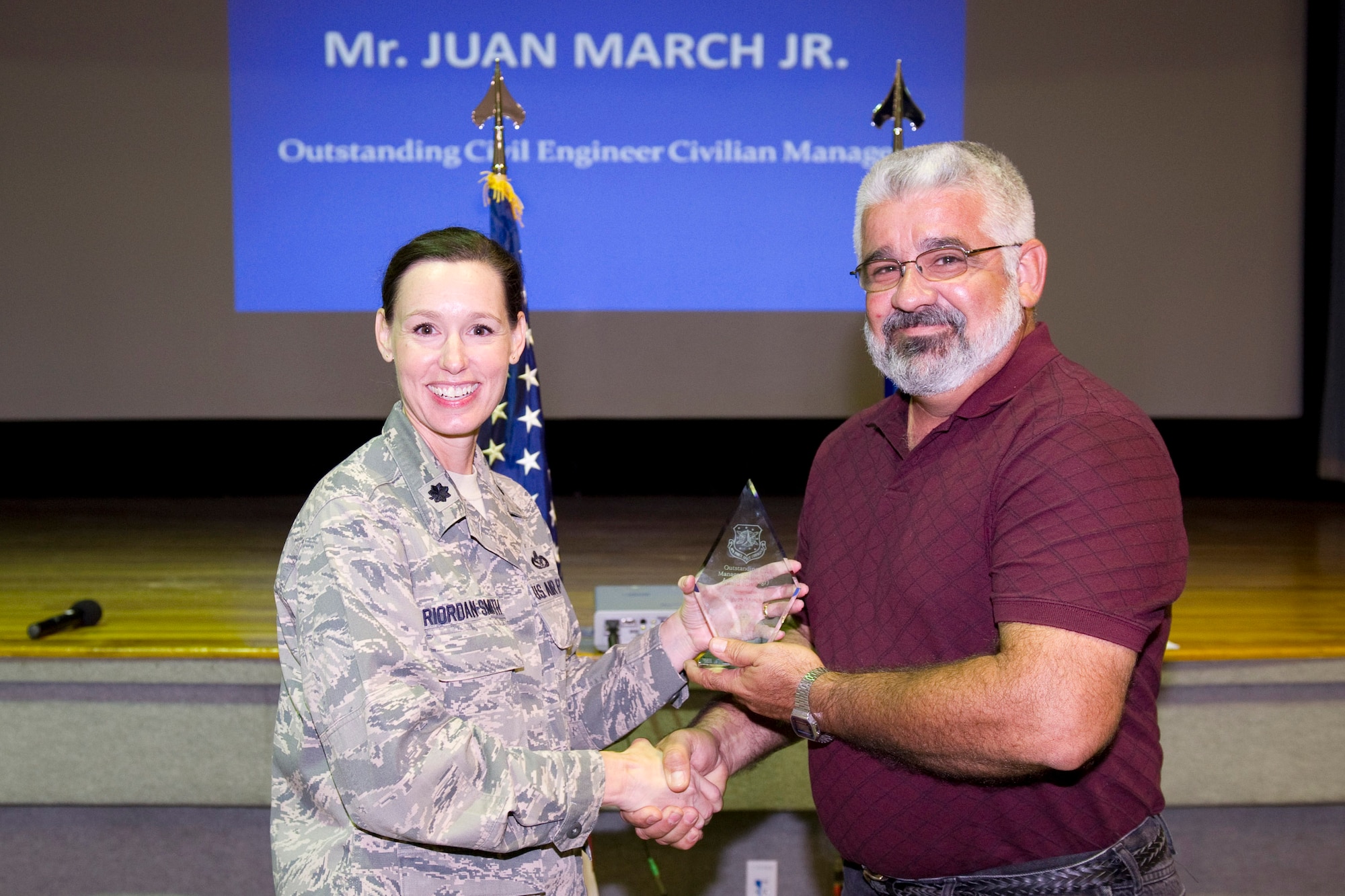 Mr. Juan March is awarded the Outstanding CE Manager of the Year, Civilian Manager Category.  
