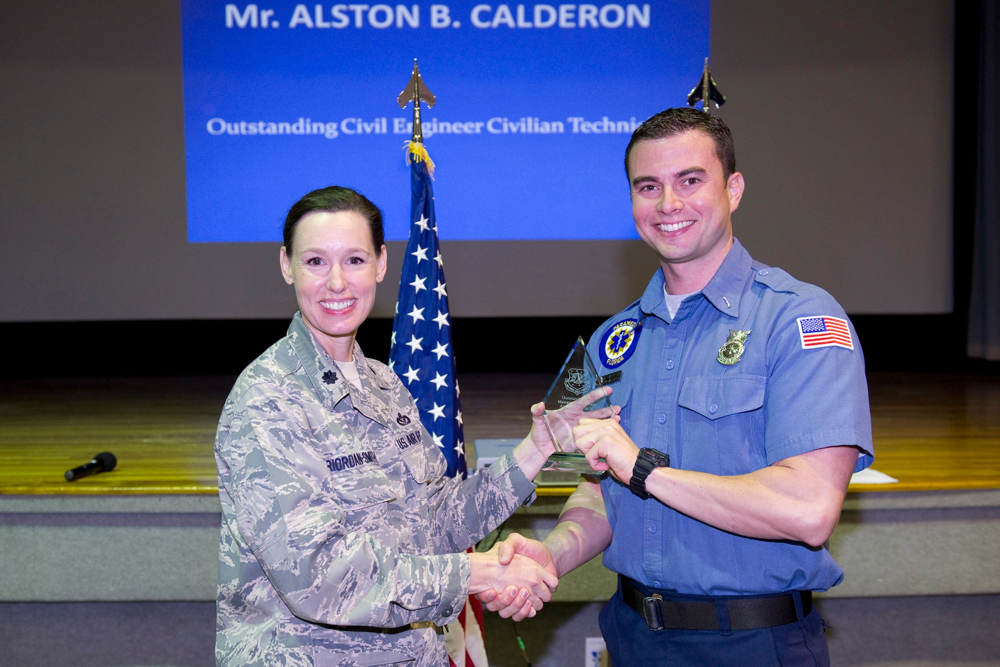 Mr. Alston Calderon is awarded the Outstanding CE Manager of the Year, Civilian Technician Category. 