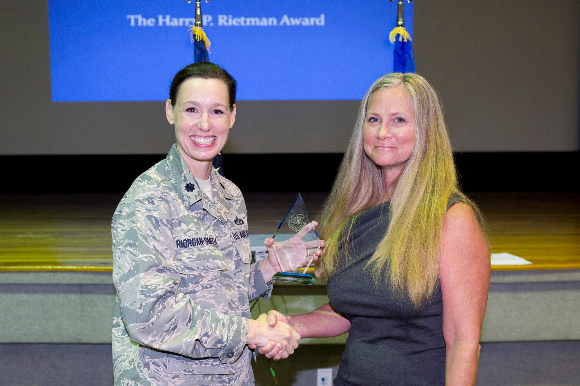 Ms. Ann Heyer is awarded the Harry P. Rietman Award, Superior Job Performance by Civilian.