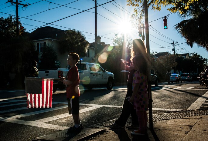 Civilians and veterans lined the streets during the Veterans Day Parade Nov. 10, 2012, in Charleston, S.C. More than a hundred Airmen and Sailors from Joint Base Charleston marched in the parade, which traveled through the streets of historic downtown Charleston. (U.S. Air Force photo/ Senior Airman Dennis Sloan)