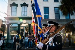 Members of the Joint Base Charleston Honor Guard march in the Veterans Day Parade Nov. 10, 2012, in Charleston, S.C. More than a hundred Airmen and Sailors from JB Charleston marched in the parade, which traveled through the streets of historic downtown Charleston. (U.S. Air Force photo/ Senior Airman Dennis Sloan)