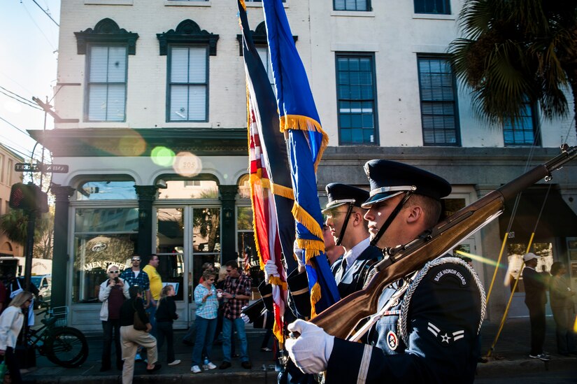 Members of the Joint Base Charleston Honor Guard march in the Veterans Day Parade Nov. 10, 2012, in Charleston, S.C. More than a hundred Airmen and Sailors from JB Charleston marched in the parade, which traveled through the streets of historic downtown Charleston. (U.S. Air Force photo/ Senior Airman Dennis Sloan)