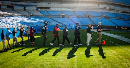 The Joint Base Charleston Honor Guard team practices presenting the Colors before the Carolina Panthers - Denver Broncos football game Nov. 11, 2012, at Bank of America Stadium,Charlotte, N.C. The Honor Guard team was invited to present the Colors for the Panther’s annual Military Appreciation Day. (U.S. Air Force photo/Staff Sgt. Anthony Hyatt)