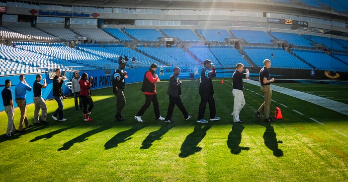 The Joint Base Charleston Honor Guard team practices presenting the Colors before the Carolina Panthers - Denver Broncos football game Nov. 11, 2012, at Bank of America Stadium,Charlotte, N.C. The Honor Guard team was invited to present the Colors for the Panther’s annual Military Appreciation Day. (U.S. Air Force photo/Staff Sgt. Anthony Hyatt)