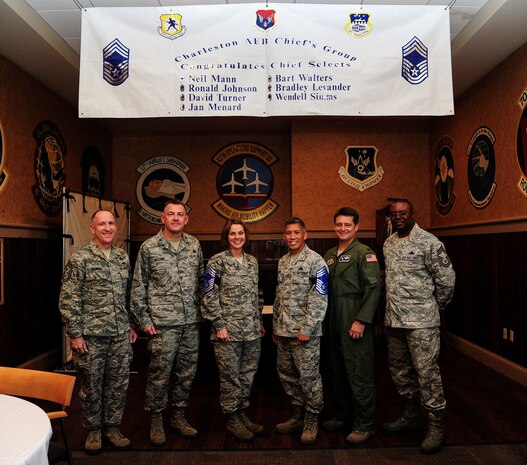 The Chief Master Sergeant Selectee promotion party took place Nov. 8, 2012, at the Charleston Club at Joint Base Charleston - Air Base, S.C.  In attendance were (left to right) Chief Master Sgt. Earl Hannon, 628th Air Base Wing command chief; Col. Richard McComb, Joint Base Charleston commander; Senior Master Sgt. Jan Menard, 628th Aerospace Medicine Squadron; Senior Master Sgt. Neil Mann, 315th Airlift Wing; Col. Russell Fingar, 315th AW vice commander; and Chief Master Sgt. Kenneth Battle, 315th Maintenance Squadron supertinendent. (U.S. Air Force photo/Staff Sgt. Rasheen Douglas) 