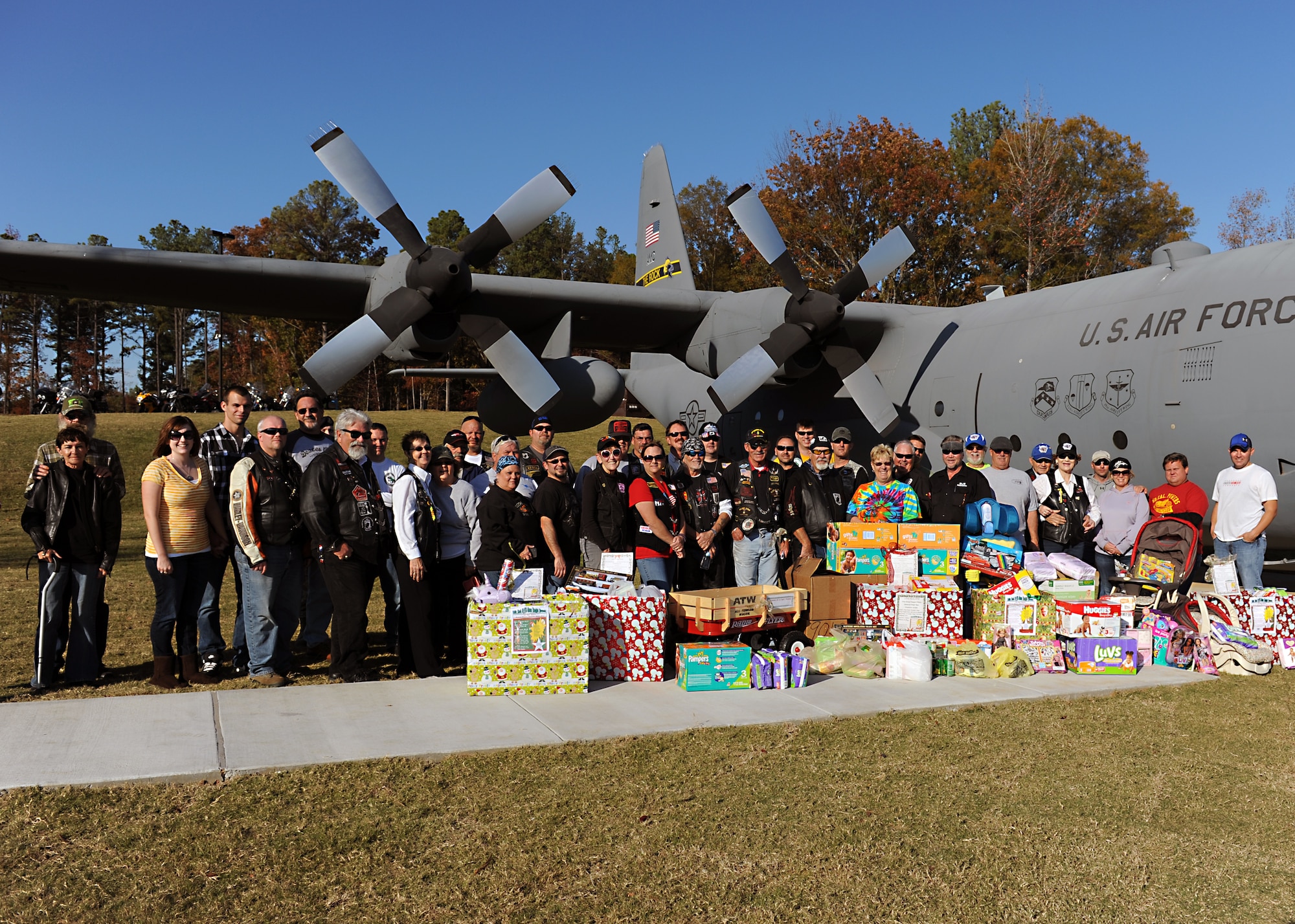 Participants in the First Annual Raegan Whaley Memorial Diaper Run present their donations at the base education center Nov. 10, 2012, at Little Rock Air Force Base, Ark. The event raised over $2,700 in monetary donations and baby related items and will be distributed to the Airmen and their families during the holiday season.  (U.S. Air Force photo by Staff Sgt. Jessica Condit)
