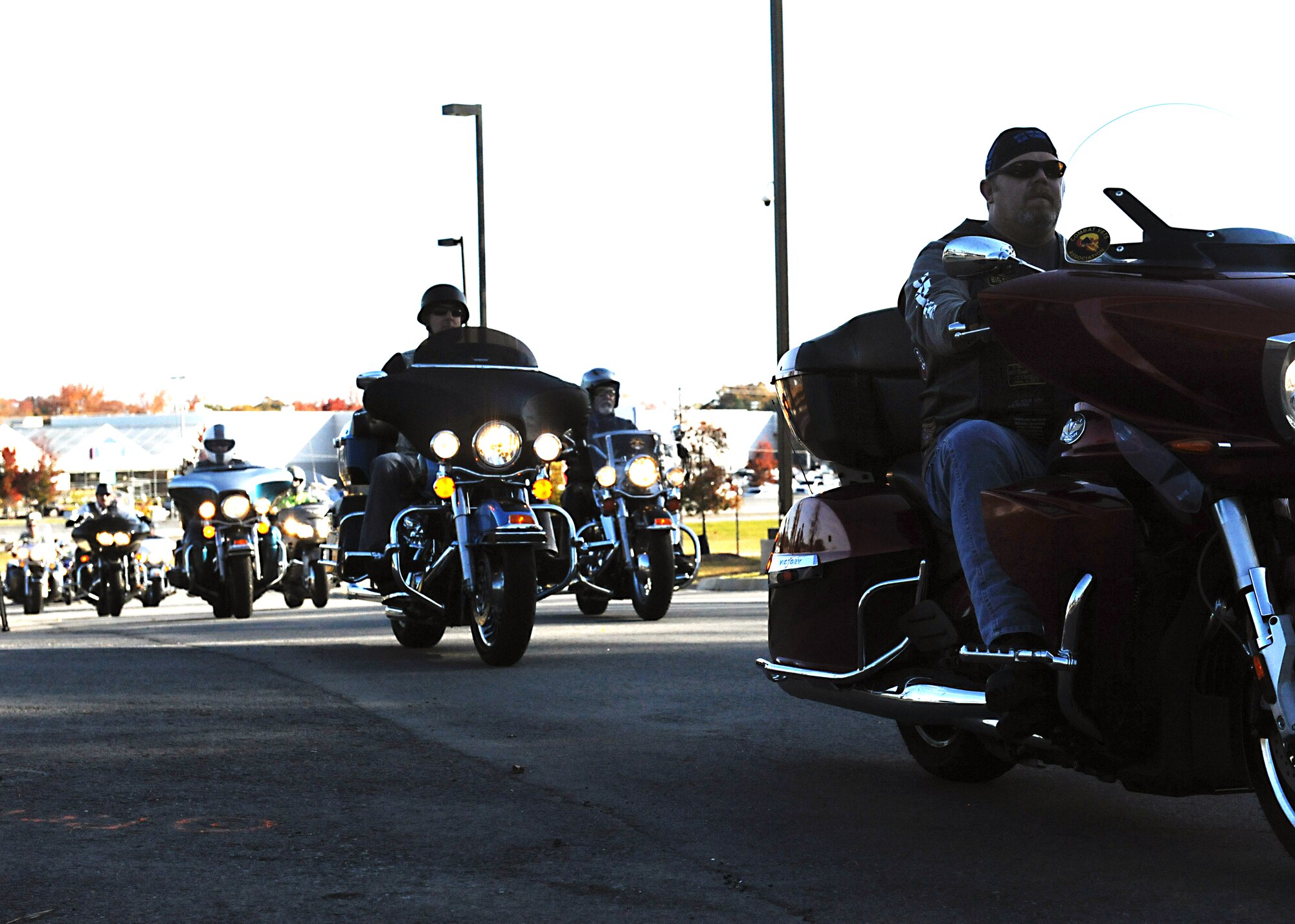 Motorcyclists arrive at the education center Nov. 10, 2012, at Little Rock Air Force Base, Ark. The motorcyclists participated in the First Annual Raegan Whaley Memorial Diaper Run, bringing over $2,700 in donations. Donations will be shared with Airmen and their families during the holiday season.  (U.S. Air Force photo by Staff Sgt. Jessica Condit)
