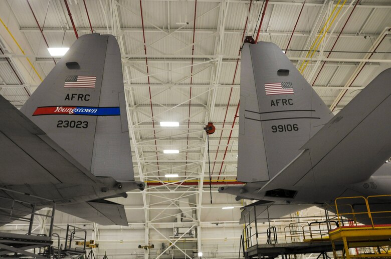 YOUNGSTOWN AIR RESERVE STATION, Ohio -- Two U.S. Air Force Reserve C-130s assigned to the 910th Airlift Wing here, sit in a hangar here, Nov. 8, 2012. 910th Maintenance Group Airmen are performing isochronal inspections (ISO), assessments, of each aircraft that help keep the 910th Airlift Wing mission-ready. Released/U.S. Air Force photo by Mr. Eric White