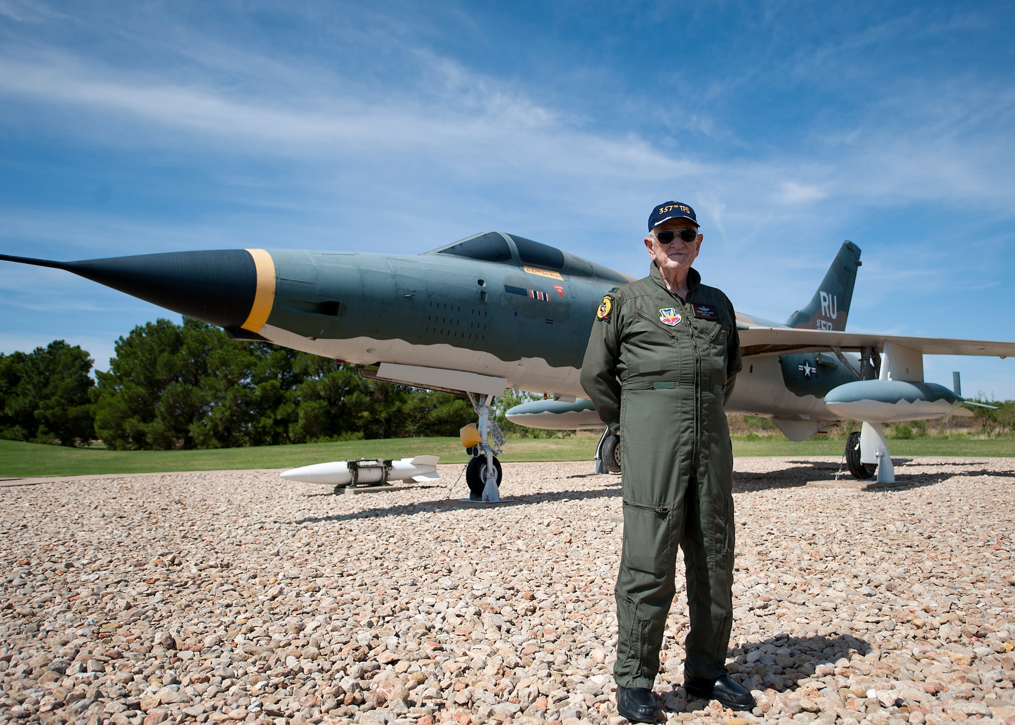 Retired Lt. Col. John C. Wright stands in front of his F-105 Sept. 24, 2012, at Dyess Air Force Base, Texas. During his career, Wright flew more than 20 aircraft and completed hundreds of missions including 100 missions over North Korea in the F-84 in 1952 and 140 missions over Loas and North Vietnam in the F-105 in 1969. (U.S. Air Force photo by Airman 1st Class Damon Kasberg/ Released)