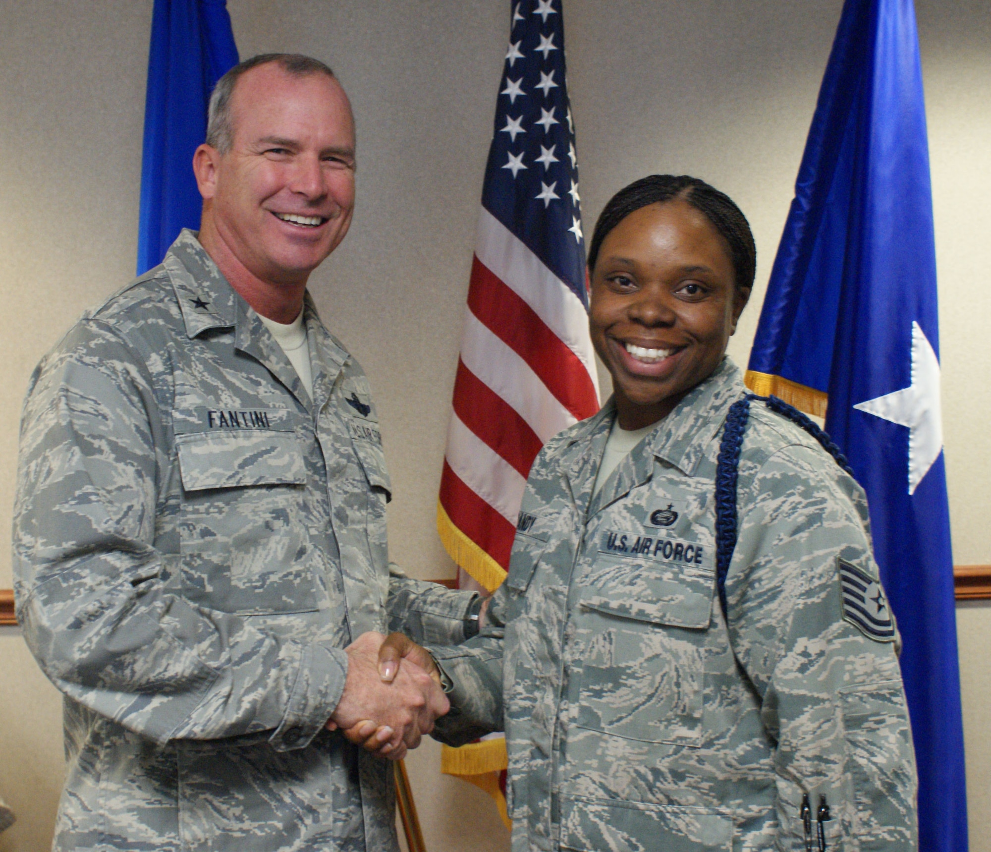 Brig. Gen. Michael Fantini, 82nd Training Wing commander, congratulates Tech. Sgt. Amethia Dandy, 363rd Training Squadron, on her selection as the "Commander's Wingman of Choice" for Nov. 12-16, 2012.  Dandy is a Military Training Leader and student scheduler and has been at Sheppard Air Force Base for two years. (U.S. Air Force photo/Dan Hawkins)