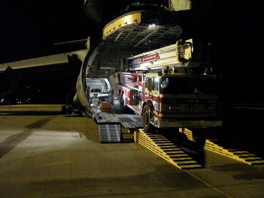 A fire truck is loaded aboard a C-5 on its way to Nicaragua as part of the Denton program (Courtesy Photo)