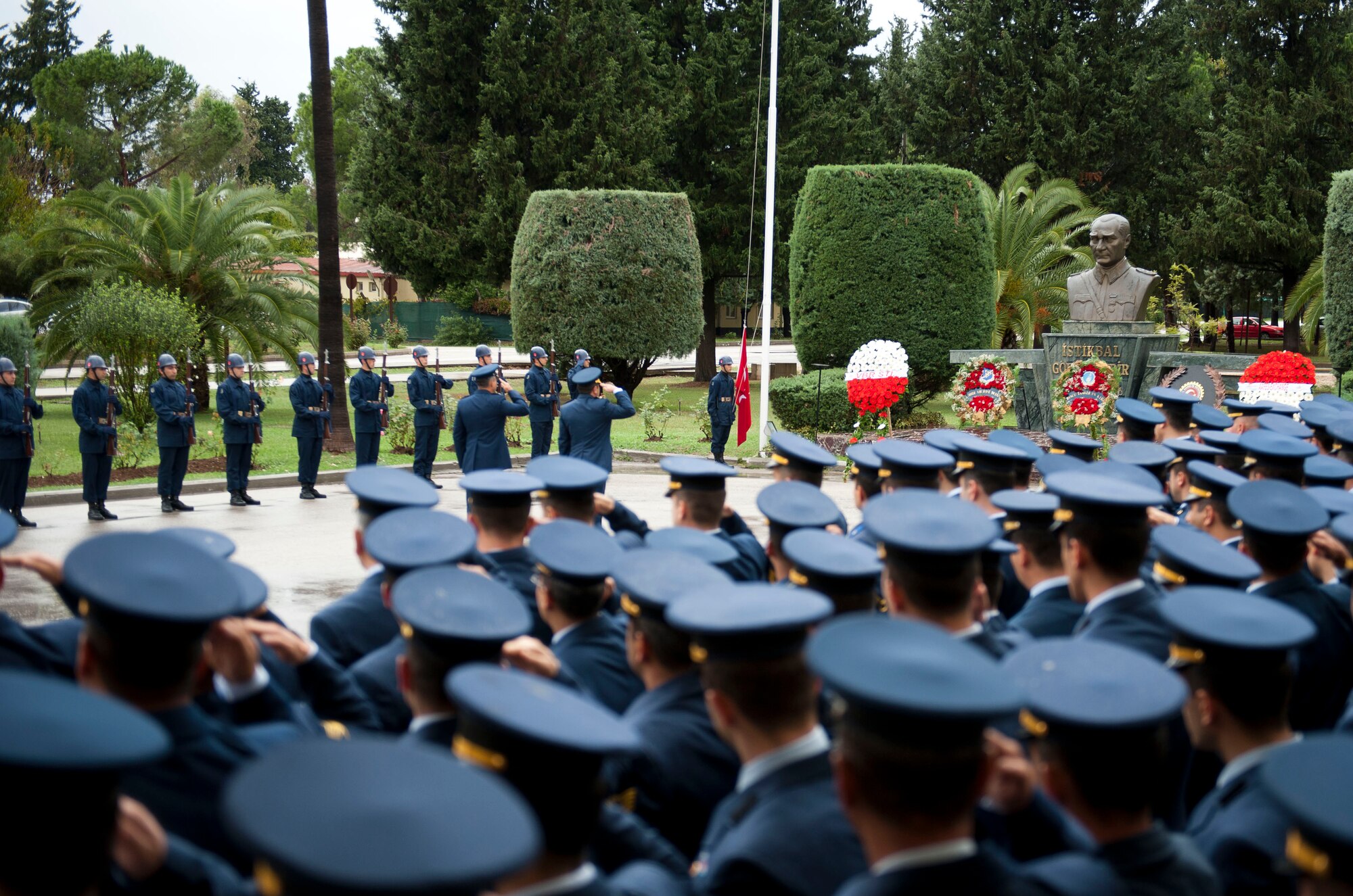 Members of Incirlik Air Base salute a monument of Mustafa Kemal Ataturk during the Ataturk Memorial Day Ceremony Nov. 10, 2012, at Incirlik Air Base, Turkey. Turkish and U.S. Airmen gathered to honor Ataturk, the founder and first president of modern Turkey, on the 74th anniversary of his death. (U.S. Air Force photo by Senior Airman Clayton Lenhardt/Released)