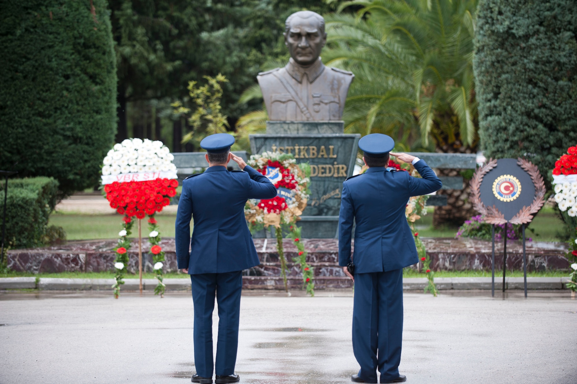 Col. Sean Gallagher, left, 39th Mission Support Group commander, and Turkish air force Lt. Col. Abdullah Demirel, 101st Air Refueling Squadron commander, salute a monument of Mustafa Kemal Ataturk during the Ataturk Memorial Day Ceremony Nov. 10, 2012, at Incirlik Air Base, Turkey. The ceremony brought members from across the base together to honor Ataturk, the founder and first president of modern Turkey. (U.S. Air Force photo by Senior Airman Clayton Lenhardt/Released)