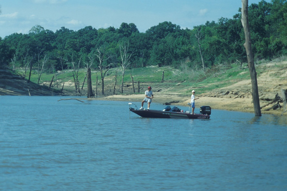 Fishing boat in cove at Lake Red Rock