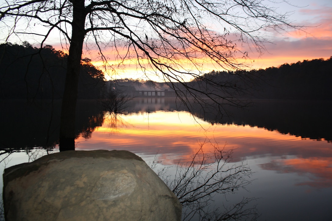 Sunrise over Nimrod Dam viewed from Quarry Cove Park.
