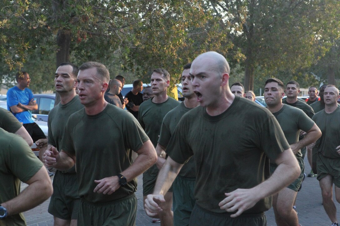 Sgt. Sebastian S. Crawford calls out the cadence for the Marine Corps Birthday Run Nov 8 on Naval Support Activity, Bahrain.