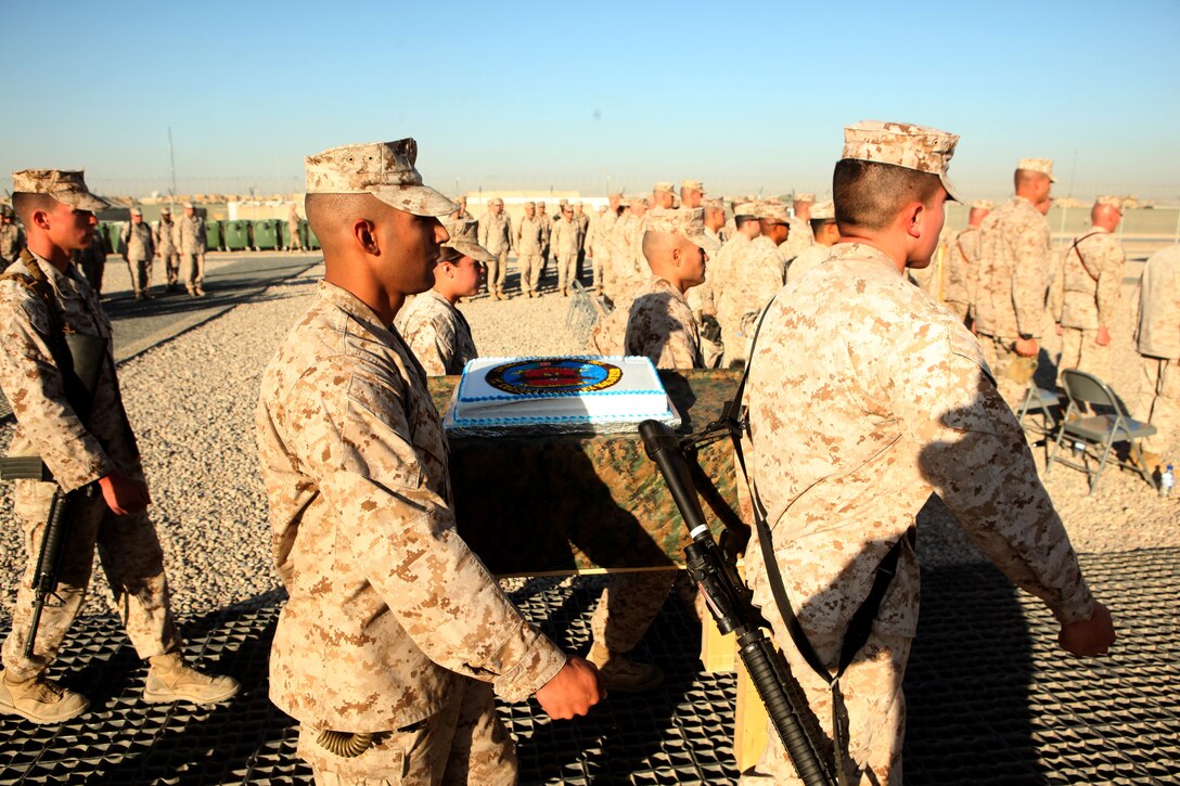 Marines with Combat Logistics Regiment-15 escort the unit’s ceremonial birthday cake during a cake cutting ceremony at Camp Leatherneck, Afghanistan, Nov. 10. The Marines with CLR-15, the Logistics Command Element in Helmand province, celebrated the Marine Corps’ 237th birthday by reading birthday messages from Gen. James Amos, the commandant of the Marine Corps, Gen. John. A. Lejeune, the 13th commandant of the Marine Corps, and by sharing a traditional birthday cake.