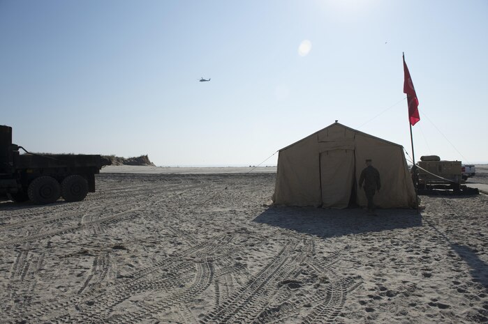 Marines with the 8th Engineering Support Battalion from Camp Lejeune, N.C., stage equipment along the boardwalk during the relief effort for Hurricane Sandy.  Hurricane Sandy was the largest Atlantic Hurricane on record and caused the most damage in New York and New Jersey Oct. 29, 2012.  (U.S. Navy photo by Mass Communication Specialist Seaman Nicholas S. Tenorio/Released)