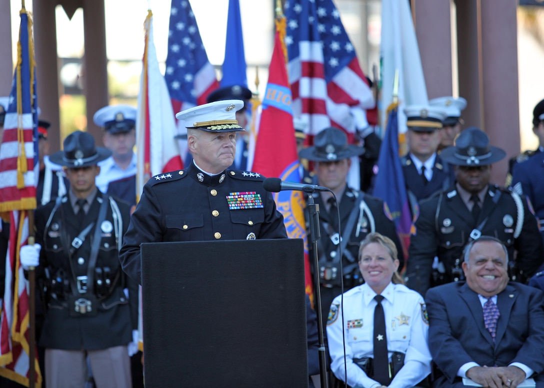 Lieutenant Gen. Robert B. Neller, Commander, US Marine Corps Forces Central Command, speaks to the Tampa Bay community, gathered downtown at the Joe Chillura square, to celebrate its veterans and remember those who could not be with us.

In his remarks, Neller told a personal story about a watch-stander he met in Al Anbar, Iraq. His story spoke to the burden of the watch-stander, the burden of those left behind, wondering why it was their buddy and not them who had paid the price.  The watch-stander he tells of was recounting a story of how his friend and squad mate was killed the day before their encounter.  Neller, noticing how he was having a hard time dealing with the loss, began to explain, “Sometimes you can do everything right and it just doesn’t work out. If your buddy were here, he’d tell you that you did the best you could and need to press on and accomplish the mission. You and the rest of your squad need to move on as best you can and take care of each other today. To do otherwise would be to dishonor his memory.”