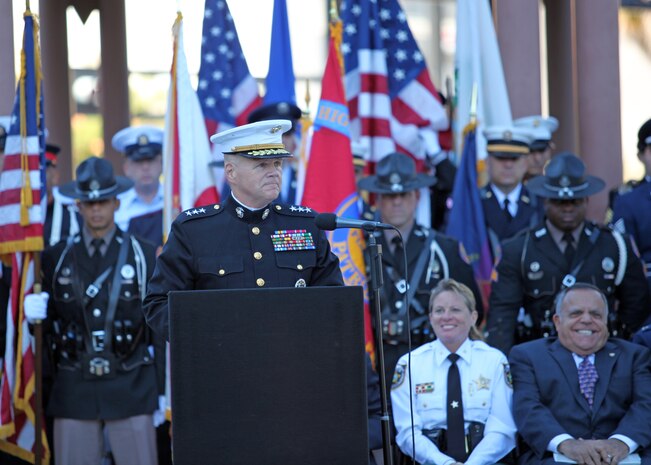 Lieutenant Gen. Robert B. Neller, Commander, US Marine Corps Forces Central Command, speaks to the Tampa Bay community, gathered downtown at the Joe Chillura square, to celebrate its veterans and remember those who could not be with us.

In his remarks, Neller told a personal story about a watch-stander he met in Al Anbar, Iraq. His story spoke to the burden of the watch-stander, the burden of those left behind, wondering why it was their buddy and not them who had paid the price.  The watch-stander he tells of was recounting a story of how his friend and squad mate was killed the day before their encounter.  Neller, noticing how he was having a hard time dealing with the loss, began to explain, “Sometimes you can do everything right and it just doesn’t work out. If your buddy were here, he’d tell you that you did the best you could and need to press on and accomplish the mission. You and the rest of your squad need to move on as best you can and take care of each other today. To do otherwise would be to dishonor his memory.”