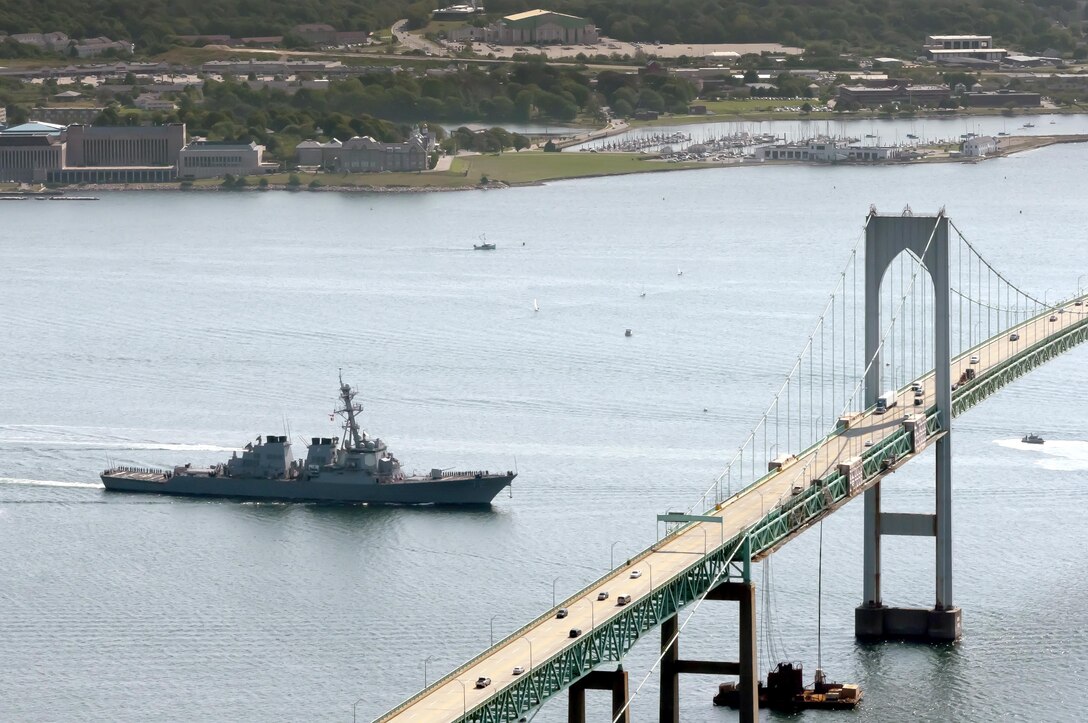 The USS Mahan prepares to pass under the Pell Claiborne Bridge as the ship departs Naval Station Newport, R.I., August 2011. Two sailors with Medical Logistics Company, 2nd Supply Battalion, 2nd Marine Logistics Group joined the crew of the Mahan to learn how to perform supply missions aboard a naval vessel Oct. 14-28, 2012.
